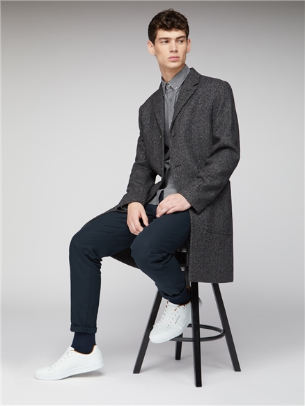 Herringbone overcoat for men styled with smart winter layers