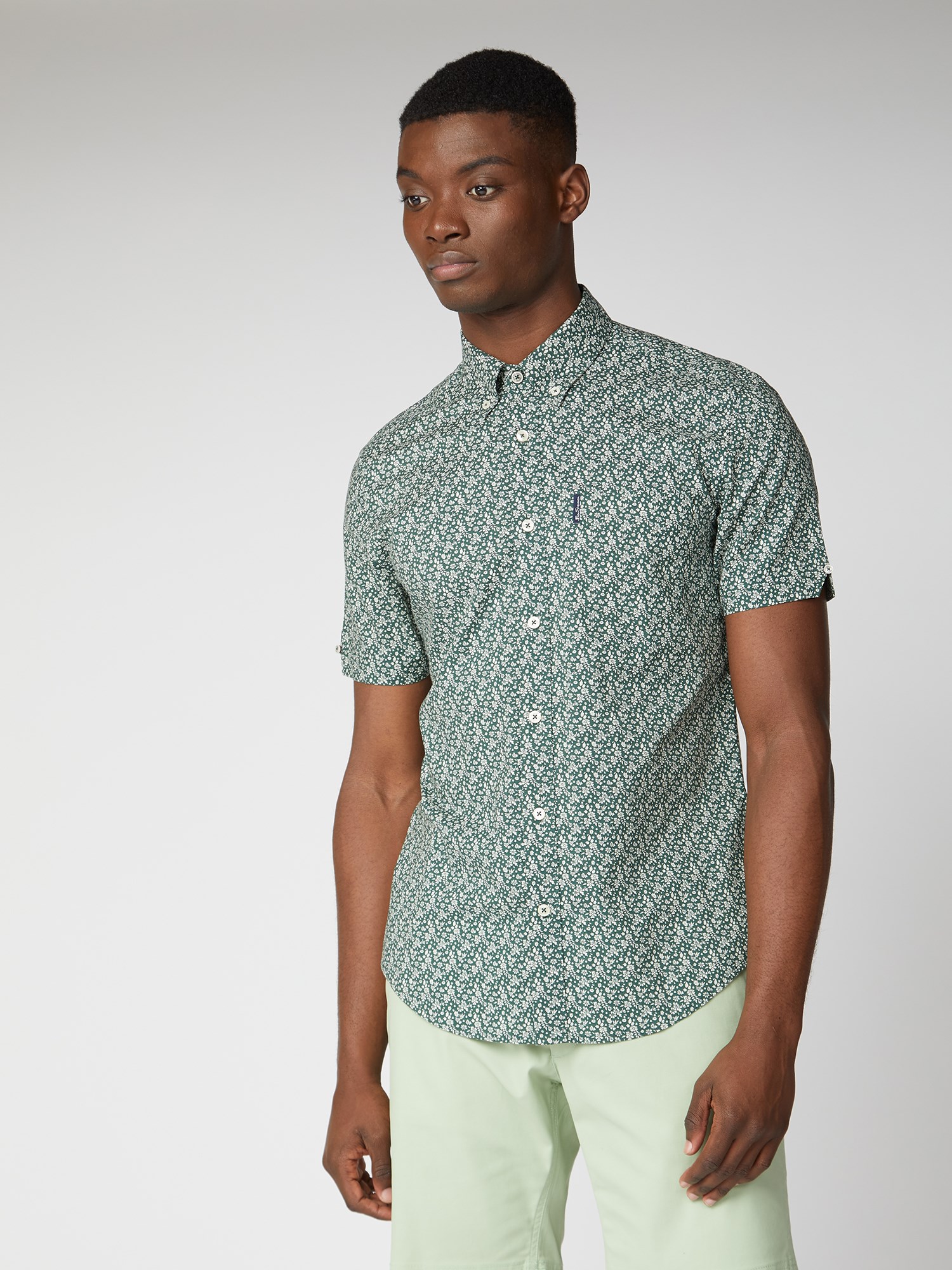 white and green floral shirt